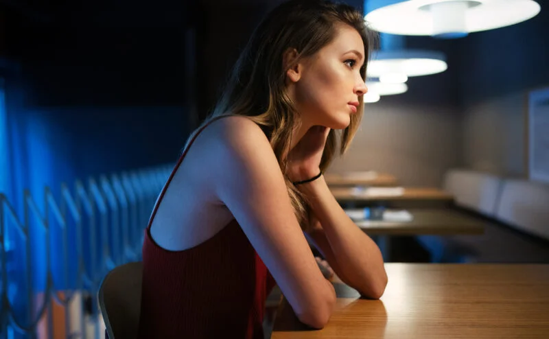 In a LDR? Learn What Kills Long-Distance Relationships And How To Fix It! 3 Young woman thinking alone will also start to have negative thoughts about her long-distance relationship