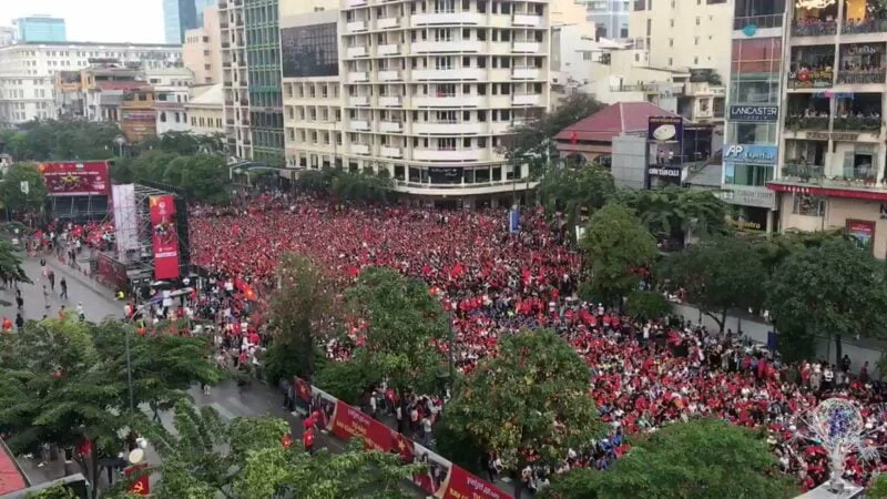Where to Watch the 2024 Champions League Final in Ho Chi Minh City 2 Vietnamese watching football in Nguyen Hue Walking Street In Ho Chi Minh City